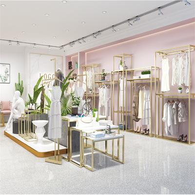 China Custom Stainless Steel 304  Cloth Display Stands Women Clothes Display Racks Metal Retail Boutique Gold Clothing Rack for sale