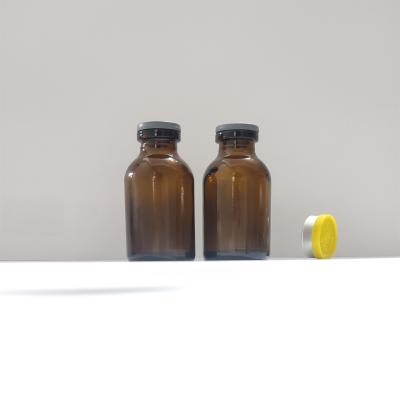 China frasco de vidrio moldeado ambar transparente envase para antibioticos frasco de vidrio inyectado ambar en venta