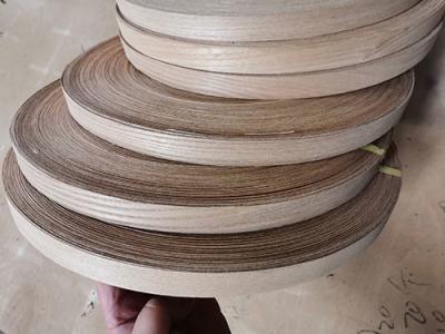 China Width 2cm Red Oak Edge Banding 0.45mm Thickness Iron On Timber Veneer Edging for sale
