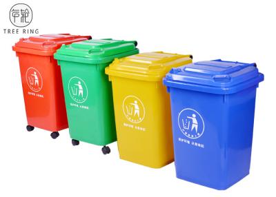 China Azul y amarillee los compartimientos plásticos de los desperdicios de 50 litros con el reciclaje de tracción a las cuatro ruedas del carro en venta