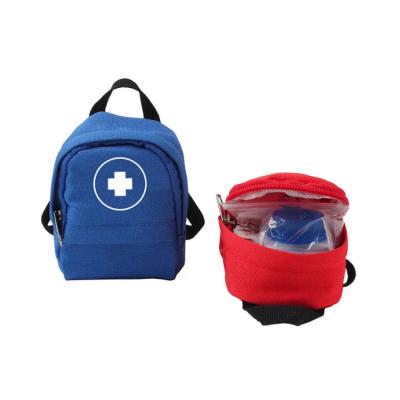 China Prenda impermeable portátil de la emergencia de Mini Backpack First Aid Kit para los niños en venta