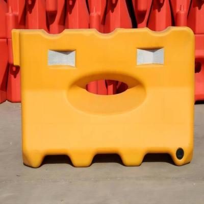 China Safety Temporary PE Plastic Road Barriers For Roadway Safety 1300X650X200X400mm for sale