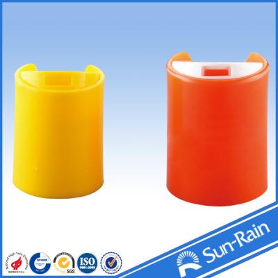 China Colorful red yellow standard disc cap for plastic shampoo bottles for sale