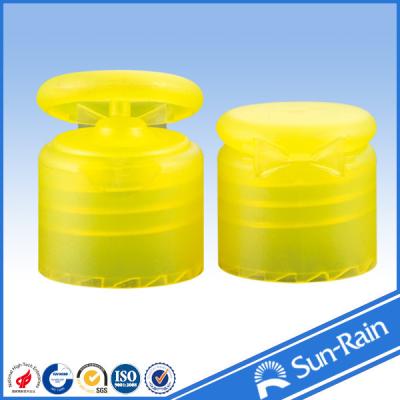 China 24mm 28mm Smooth closure yellow flip top bottle cap for cosmetic bottle for sale