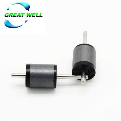 China 19X20 Injection Molded Ferrite Ndfeb Small Cylinder Magnets Rotor With Shaft for sale