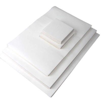 China Papel de pergaminho de silicone antiaderente mais vendido para fins de cozimento e churrasco à venda
