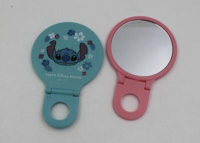 China Mini Cute Round Travel Makeup Mirrors With Folding Handle For Children for sale