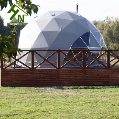 China Outdoor Igloo Geodesic Dome Tent Glamping Hotel With Wooden Platform Patio for sale