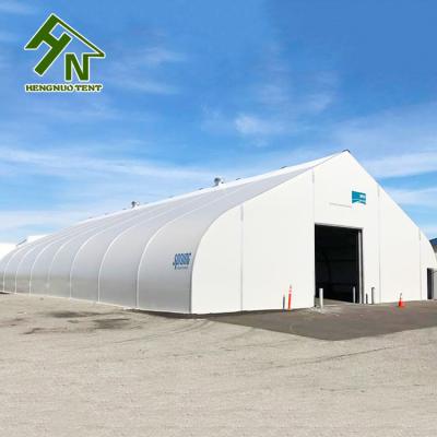 China Curved 30m Wide Portable Garage Tent Permanent Logistics Storage Shelter Marquee for sale