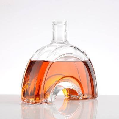 China Custom Logo Embossed Clear Glass Bottle 500ml 700ml 750ml for Rum Tequila Gin Brandy for sale