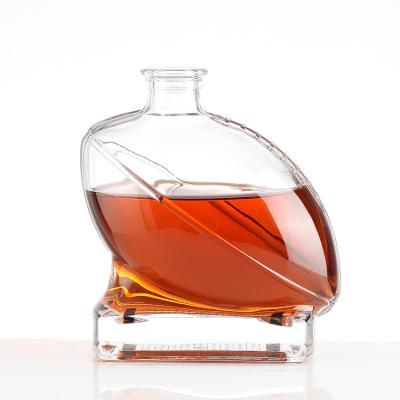 China Base Material Super Flint Glass Shaped Oval 700ml Liquor Vodka Tequila Rum Bottle for sale