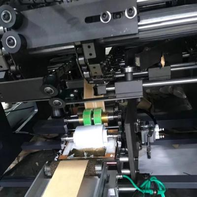 China High Speed Kraft Paper Bag Making Machine 300 pcs/min , Twisted Paper Rope Handle Making Machine for sale