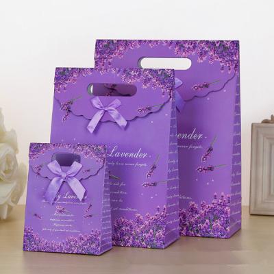 China Custom Printed Paper Gift Bags With Velcro Closure for sale