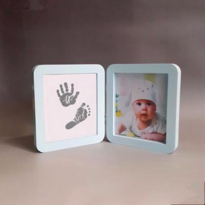China Wood Material Custom Photo Frame 12 Month Baby Handprint And Footprint Kit for sale