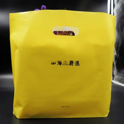 China el goodie plástico pitented logotipo empaqueta con las manijas, cortó las bolsas de plástico con tintas para hacer compras en venta