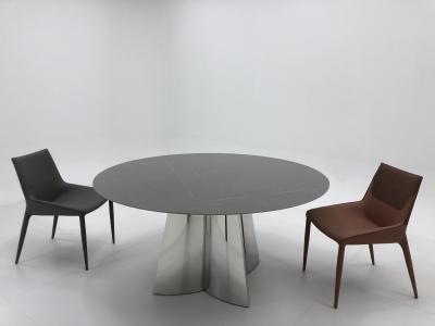 China Mesa redonda de metal con piernas cruzadas de mármol, mesa y sillas de mármol gris. en venta