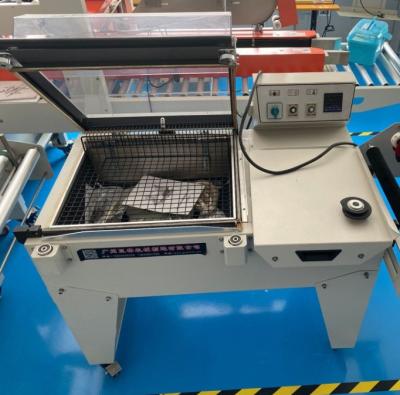 China Semi Automatic Heat Shrink Packaging Machine L-Shaped Sealing And Cutting Machine for sale