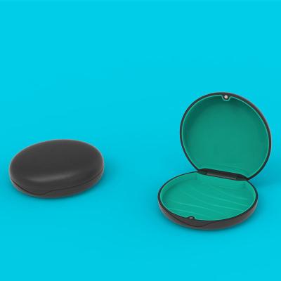 China Round Plastic Dental Retainer Box For Invisible Braces Storage for sale
