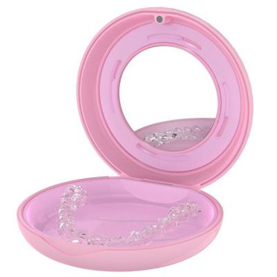 China Dental Aligner And Retainer Case Pink Retainer Holder Round Shape for sale