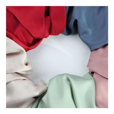 China 50D Knitted Jacquard Fabric Super Soft Elastic Imitation Silk High Density Pajama Women Clothing Fabric à venda