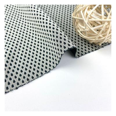 中国 120g  Stain Repellent Fabric Single Layer Hexagonal Polyester Mesh Fabric 販売のため