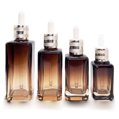 China Exquisite 30ml 50ml Empty Essential Oil Bottles  Glass Cosmetic Dropper Bottle for sale