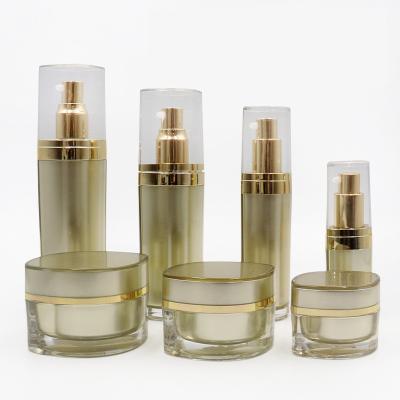 China Hot Stamped Cosmetic Packaging Set With Cap Pump Pc308 Frosted Clear Cover Acrylic Cap for sale