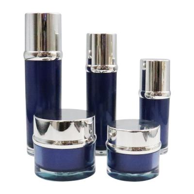 China Customized Pump And Cap Cosmetic Packaging Set With Acrylic Cap for sale