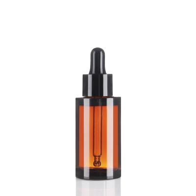 China 30ml Cosmetic Bottles Heavy Wall Amber Plastic Bottles With Dropper for sale