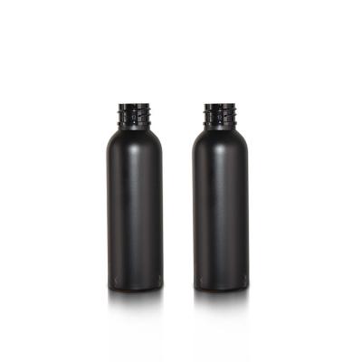China Viaje 60 ml Boston Botella redonda para el cuidado del cabello Contenedores de plástico Color negro personalizado en venta