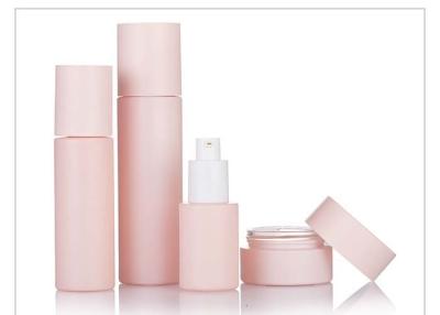 China Round Pink 2oz 3oz Custom Glass Cosmetic Bottles Frosted Makeup Pump Bottle for sale