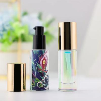 China 30ml 1oz Mixed Colour Glass Essential Bottle With Pump Luxury Skincare Packaging à venda
