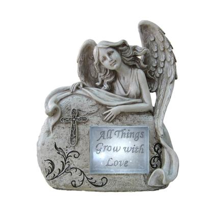 China Customized Classical Angel Love Garden Solar Light Ball For Garden Ornaments for sale