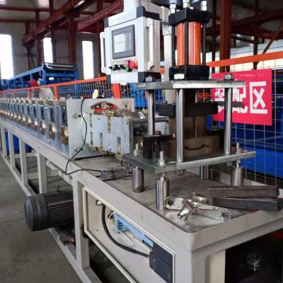 China Steel Strip Roller Shutter 1.5mm Metal Door Frame Roll Forming Machine for sale