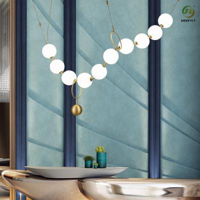 China Nordic postmodern light luxury living room glass ball necklace line chandelier for sale
