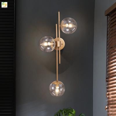China Simple Background Decorative Glass Post Modern Wall Light For Bedroom Living Room for sale