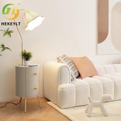 China Modern Simple Shelving Floor Lamp Bedside Table Drawer Lamp For Bedroom Living Room Sofa à venda