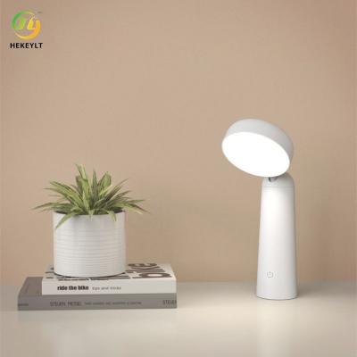 China Modern Minimalist Table Lamp Three Color Stepless Dimming USB Charging Table Lamp LED Touch Switch en venta
