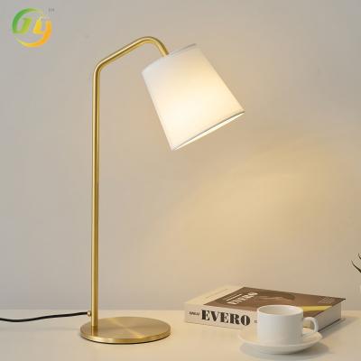 China Modern Rustic Style Fabric-Shaped Bedroom Bedside LED Table Lamp Warm Bright Desk Study Copper Table Lights for sale