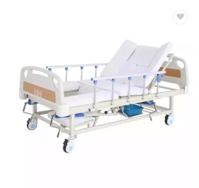 China Multifunction Cama De Manual Medical Hospital Home Care Nursing Bed With Toilet for sale