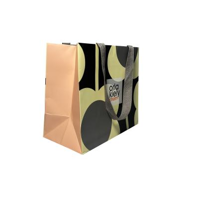 China 100gsm-450gsm Fashionable Luxury Tote Paper Bag With Handle for sale