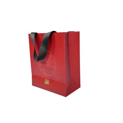 China Custom Fashion Red Kraft Paper Shopping Bags With Logo Printed for sale
