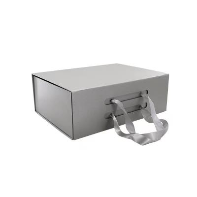 China Silver Grey Luxury Folding Gift Boxes Oem Small Cardboard Gift Box With Long Strip for sale