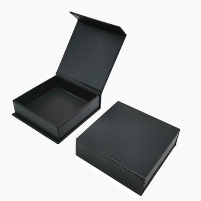 China Debossed Logo Luxury Folding Gift Boxes Black Printed Paper Presentation Box for sale