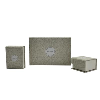 China Magnetic Matt Lamination Folding Paper Gift Box With Glossy Black UV Coating Logo for sale