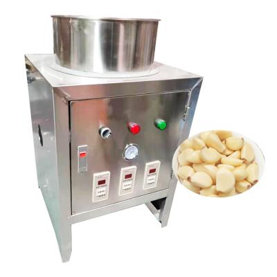 China Top Industrial Peel Peeled Wholesale Automatic Dry Pneumatic Garlic Peeling Machine Trade for sale