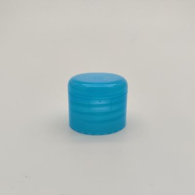 China Round Top 28/410 blue Plastic Flip Top Cap For Lotion Bottle for sale