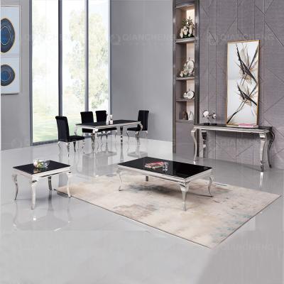 China 12mm Tempered Glass Dining Table 6 Chairs Stainless Steel Legs for sale