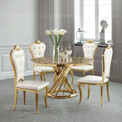 China Gold 0.4CBM Stainless Steel Banquet Table 130cm Round Marble Dining Table for sale