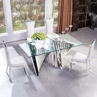 China Rectangular 70 inch Minimalist Glass Dining Table Curve Polished Chrome SS Frame for sale